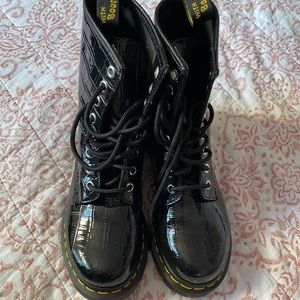 Dr. Martens patent crocodile boots.